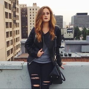 Black Rivet Genuine Leather Jacket.